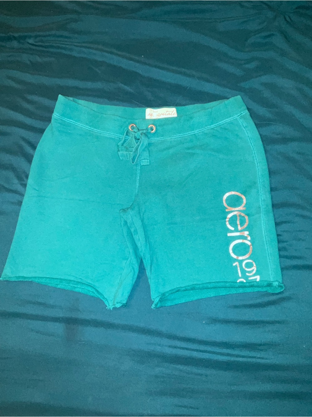 Aeropostale Women’s teal shorts with silver leg logo M